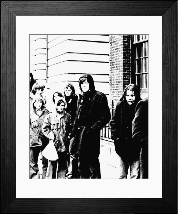 Framed Print : These teenage David Bowie fans queue in pouring rain for tickets for his concert Framed Print : These teenage David Bowie fans queue in pouring rain for tickets for his concert