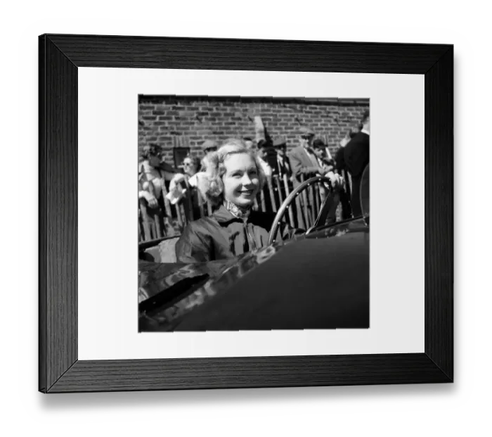 Framed Print : Racing at Goodwood, Carol Fisher, one of the drivers in the ladies race. 1st June 1955 Framed Print : Racing at Goodwood, Carol Fisher, one of the drivers in the ladies race. 1st June 1955