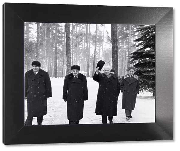 Nikita Khrushchev Soviet Leader pictured waving his hat as he walks in the snow with