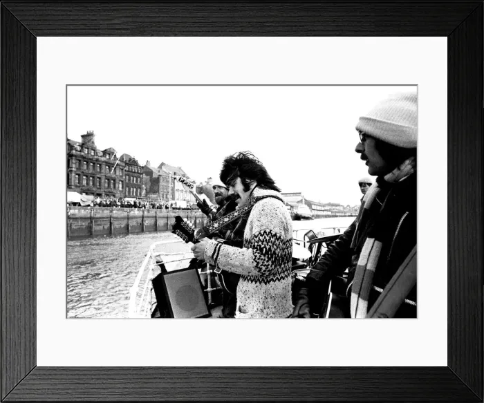 Framed Print : Lindisfarne sailed down the Tyne on a musical journey. The group were filming on board a Framed Print : Lindisfarne sailed down the Tyne on a musical journey. The group were filming on board a