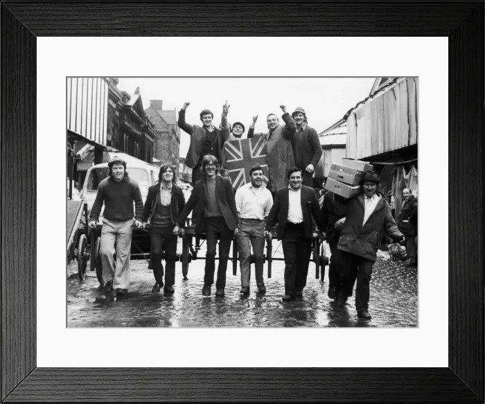 Framed Print : Workers at the Smithfield Market parade a Spud Sack Jack - the Union Jack was last used