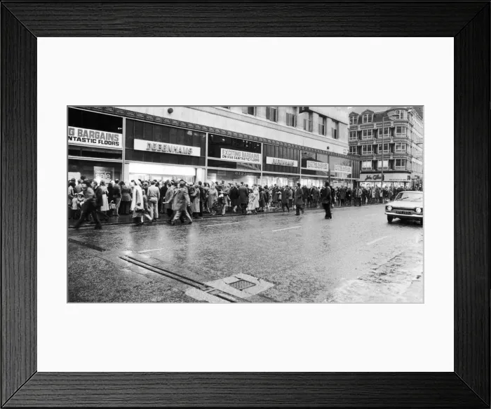 Framed Print : People queue around the Debenhams building in Market Street Framed Print : People queue around the Debenhams building in Market Street