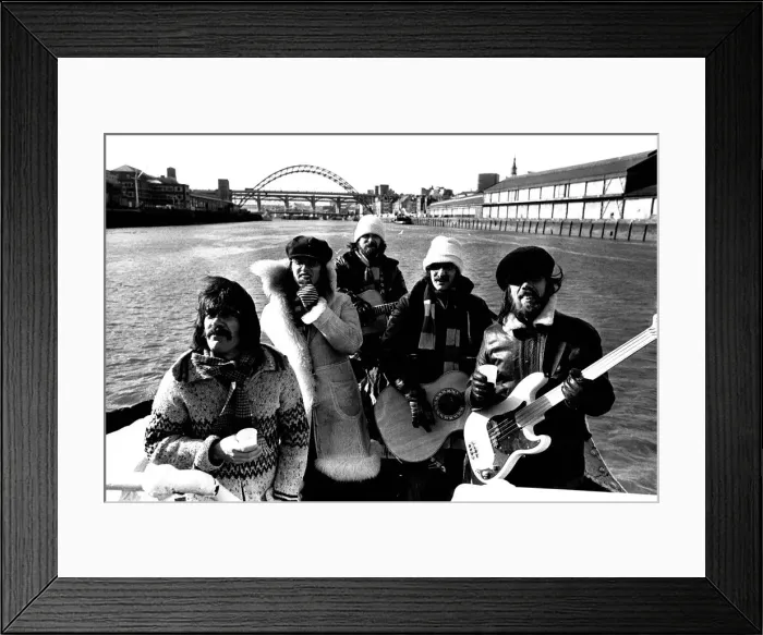 Framed Print : Lindisfarne sailed down the Tyne on a musical journey. The group were filming on board a Framed Print : Lindisfarne sailed down the Tyne on a musical journey. The group were filming on board a
