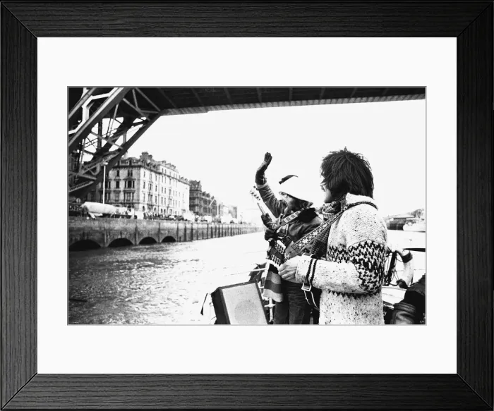 Framed Print : Lindisfarne sailed down the Tyne on a musical journey. The group were filming on board a Framed Print : Lindisfarne sailed down the Tyne on a musical journey. The group were filming on board a
