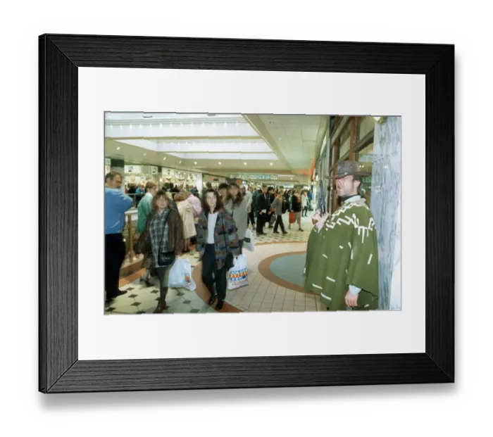 Framed Print : From Dirty Harry to good clean fun. Clint Eastwood lookalike Phil Novak draws stares