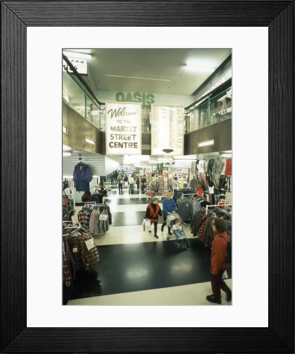 Framed Print : Shoppers browsing in the Market Street Centre, Manchester. 26th October 1994