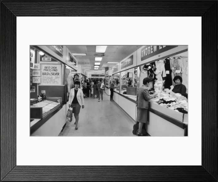 Framed Print : Shoppers browsing in Manchesters High Street Market. 10th July 1985 Framed Print : Shoppers browsing in Manchesters High Street Market. 10th July 1985