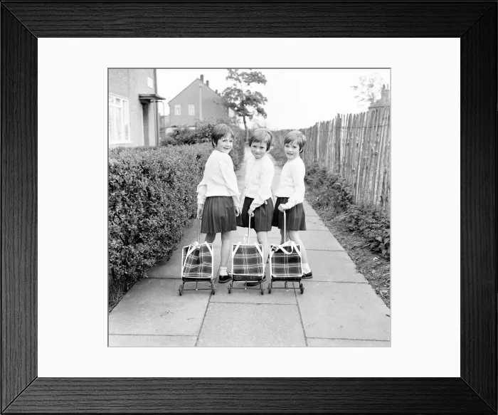Framed Print : The Hatton triplets from Manchester, Deborah, Sharon and Allison now terrorising their Framed Print : The Hatton triplets from Manchester, Deborah, Sharon and Allison now terrorising their