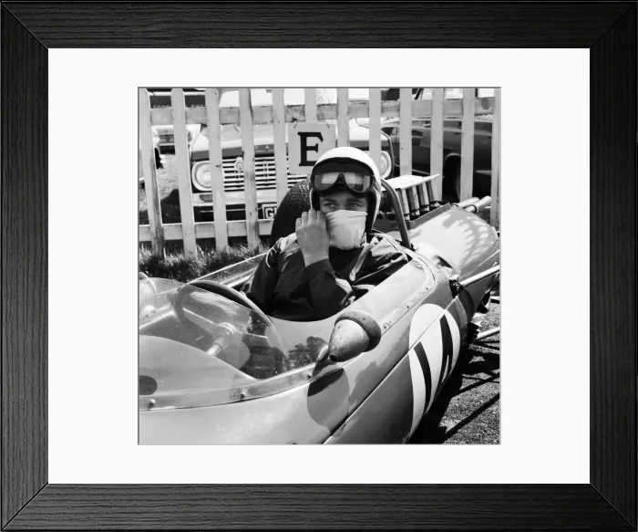 Framed Print : Goodwood International Race Meeting, Easter Monday. A driver in the main race Framed Print : Goodwood International Race Meeting, Easter Monday. A driver in the main race
