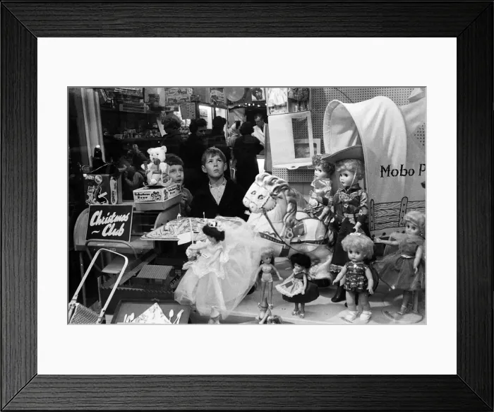 Framed Print : Children look longingly at toys into shop window at Christmas, 16th December 1960 Framed Print : Children look longingly at toys into shop window at Christmas, 16th December 1960
