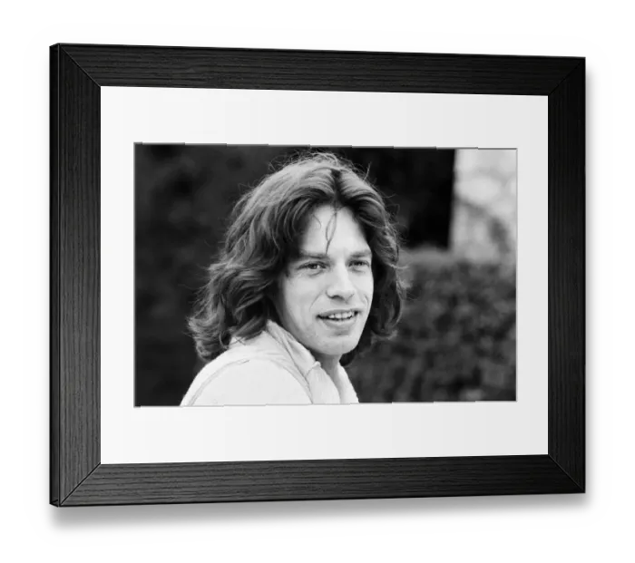 Framed Print : Mick Jagger takes time out to relax in the South of France by playing tennis with fellow Framed Print : Mick Jagger takes time out to relax in the South of France by playing tennis with fellow
