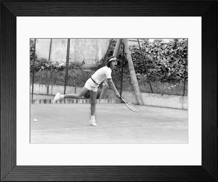 Framed Print : Mick Jagger takes time out to relax in the South of France by playing tennis with fellow Framed Print : Mick Jagger takes time out to relax in the South of France by playing tennis with fellow