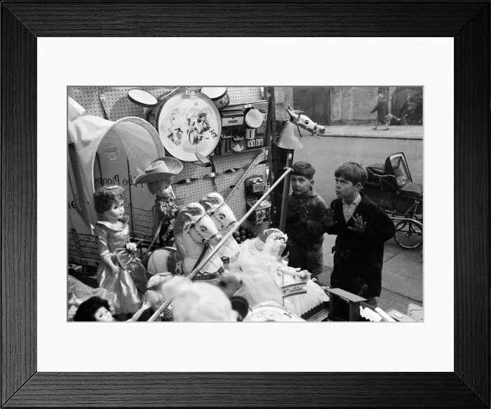 Framed Print : Children look longingly at toys into shop window at Christmas, 16th December 1960 Framed Print : Children look longingly at toys into shop window at Christmas, 16th December 1960