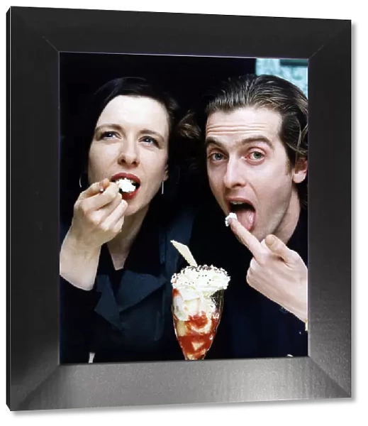 Actor Peter Capaldi eating cream with his actress wife Elaine