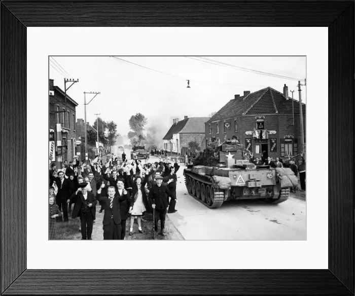 Framed Print : Crowds gather and cheer in the streets of Brussels, Belgium as British soldiers Framed Print : Crowds gather and cheer in the streets of Brussels, Belgium as British soldiers