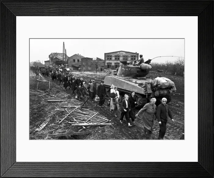 Framed Print : Civilians leave Erkelenz, Germany after its capture by the Allies. March 1945 Framed Print : Civilians leave Erkelenz, Germany after its capture by the Allies. March 1945