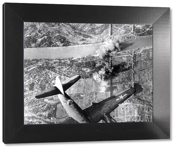B26 Marauder bomber attacks Neuenberg rail span across the Rhine as the US Seventh Army