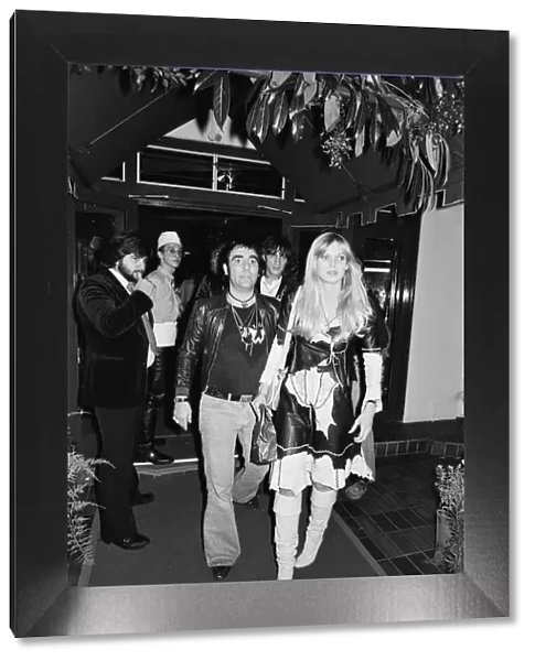 Keith Moon, drummer of the British rock group The Who, attending the the premier of