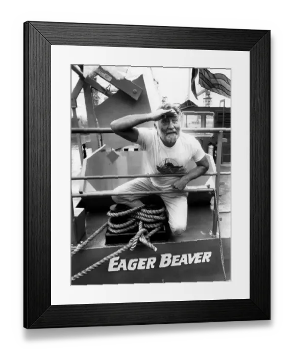 Framed Print : On the lookout for debris... Dr David Belamy at the launching of the Eager Beaver