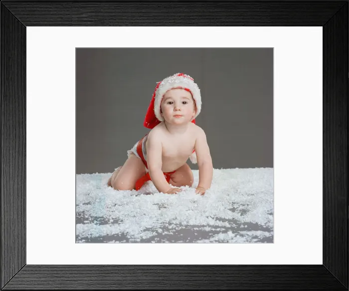 Framed Print : Baby wearing Christmas Hat, Circa December 1997