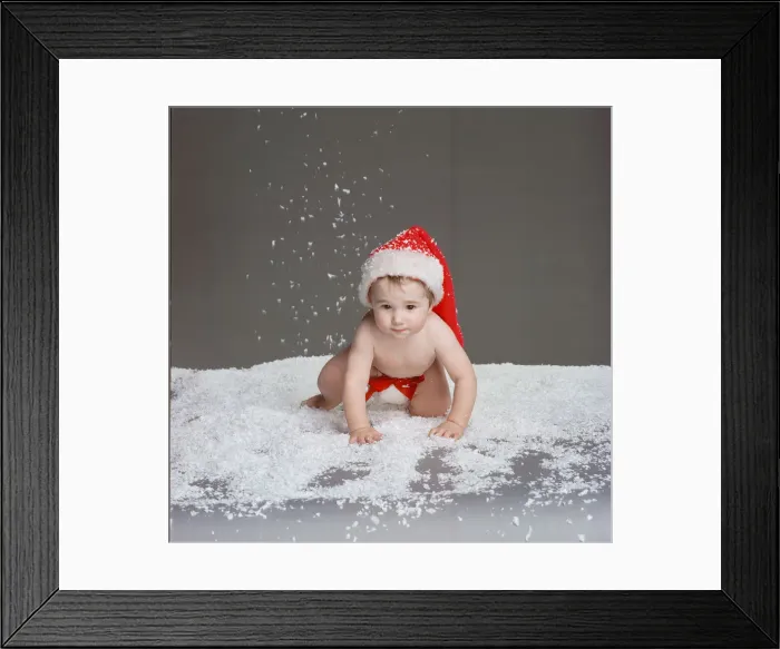 Framed Print : Baby wearing Christmas Hat, Circa December 1997