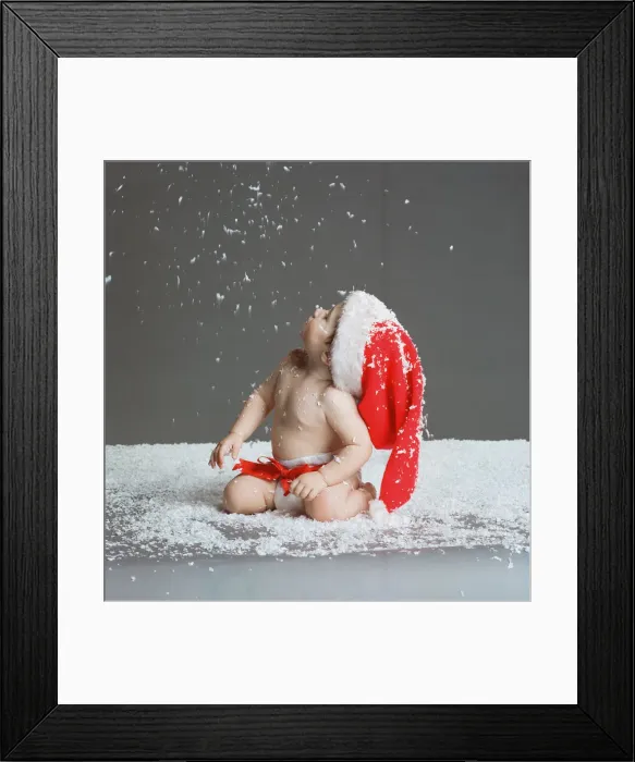 Framed Print : Baby wearing Christmas Hat, Circa December 1997