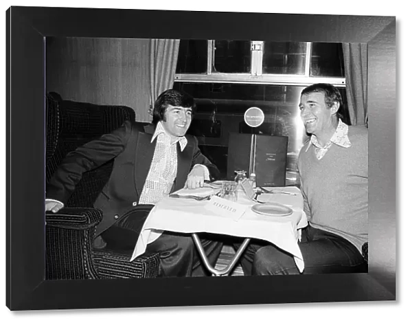 Crystal Palace manager Malcolm Allison meets Terry Venables on the train as they travel