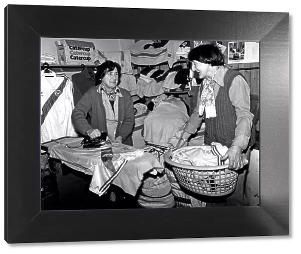 Crystal Palace laundry ladies prepare the shirts before a game against Manchester United