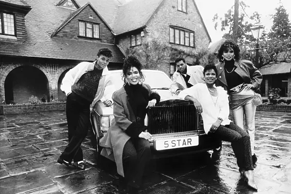 Five Star pop group stand outside mansion in Berkshire with new Rolls Royce Dbase