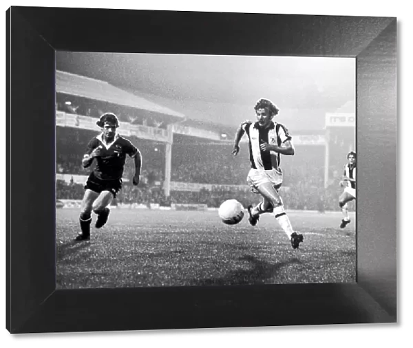 David Mills attacking the Manchester United goal area with Jimmy Nicholls in pursuit