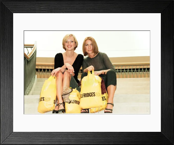 Framed Print : DJ Sara Cox and Meg Matthews wife of Noel Gallagher, photo-call to open new Selfridges