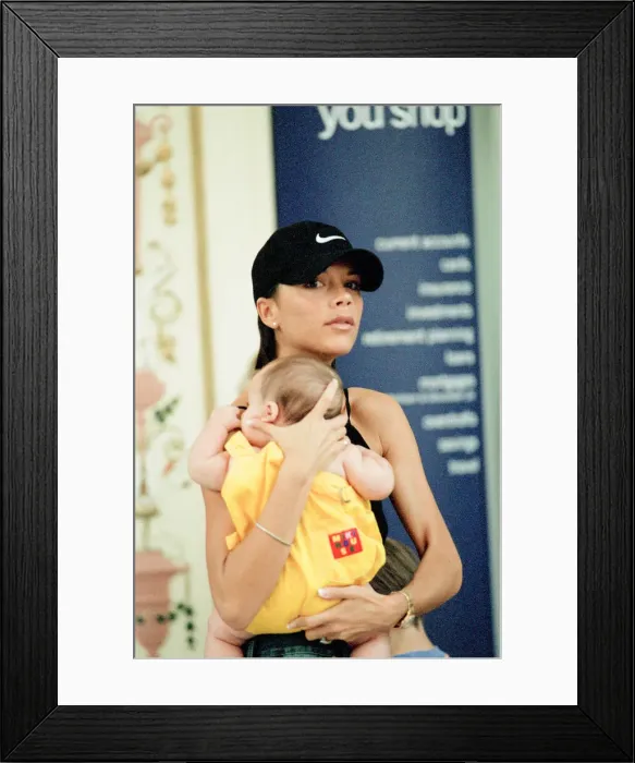 Framed Print : Victoria Beckham and baby son, Brooklyn Beckham, pictured out during shopping trip Framed Print : Victoria Beckham and baby son, Brooklyn Beckham, pictured out during shopping trip