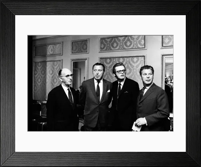 Framed Print : Billy Marsh, Bernard Delfont, Michael Grade, and Dennis van Thal attend a reception