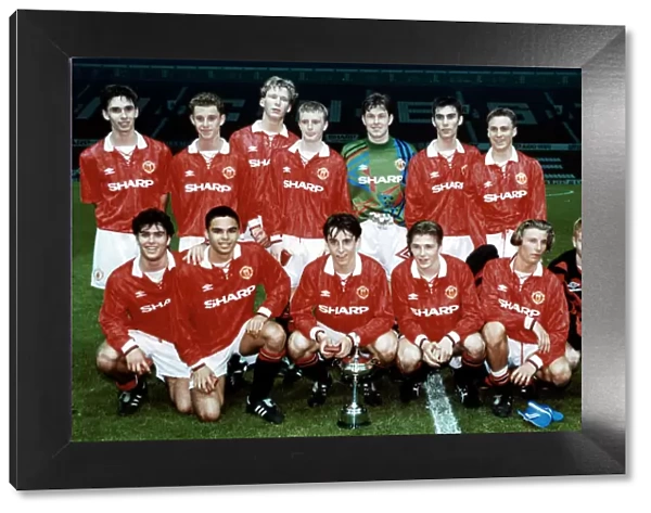 Manchester United youth team pose with the Lancashire Youth Cup following their victory