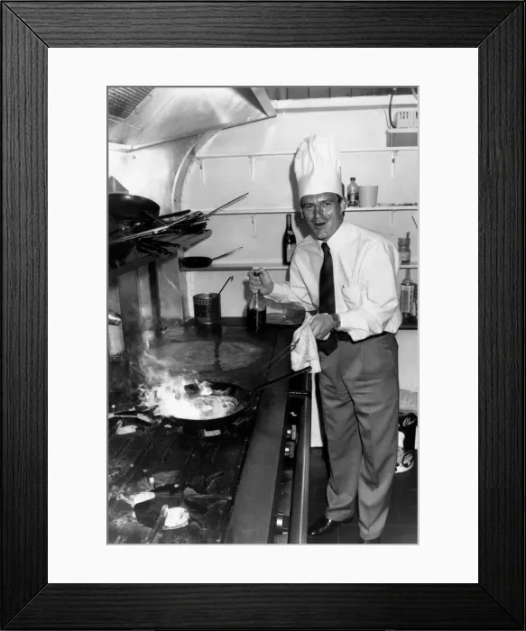 Framed Print : Crystal Palace manager Steve Coppell wearing chefs hat while cooking in the kitchen Framed Print : Crystal Palace manager Steve Coppell wearing chefs hat while cooking in the kitchen