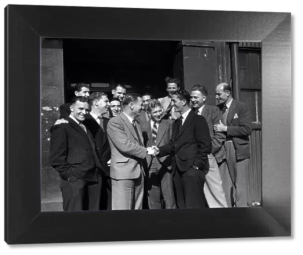 Crystal Palace players welcome their new manager Ronnie Rooke to the club