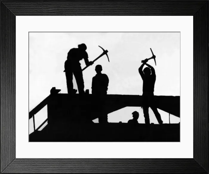 Framed Print : A silhouette of four demolition workers perched high above Newgate Street Framed Print : A silhouette of four demolition workers perched high above Newgate Street