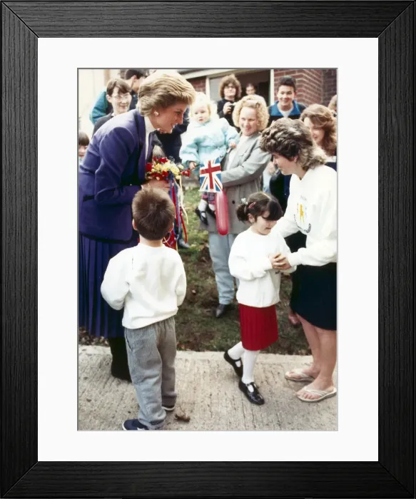 Framed Print : Leanne Venison finds it a little to much to present a posy to Princess Diana during her Framed Print : Leanne Venison finds it a little to much to present a posy to Princess Diana during her