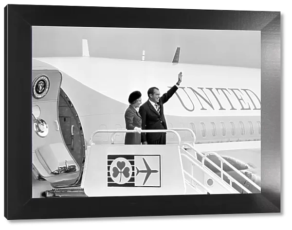 American President Richard Nixon waves to the crowds from Air Force One with his wife Pat