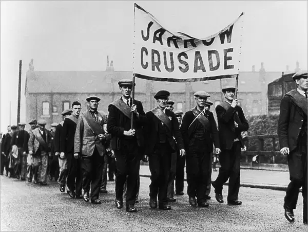 Unemployment Jarrow Marchers men in uniform carrying a banner reading