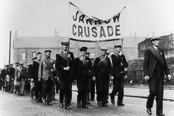 Unemployment Jarrow Marchers men in uniform carrying a banner reading