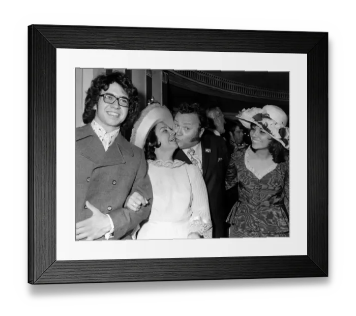 Framed Print : Former Goon Harry Secombe receives a kiss from his wife Myra at the Variety