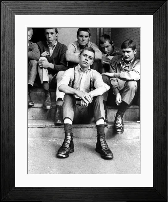 Framed Print : A group of skinheads sitting on the steps of Thomson House, works entrance Framed Print : A group of skinheads sitting on the steps of Thomson House, works entrance