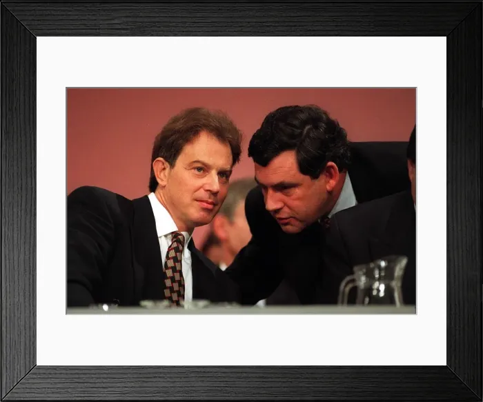 Framed Print : Tony Blair MP and Labour leader is spoken to on the platform by Gordon Brown shadow Framed Print : Tony Blair MP and Labour leader is spoken to on the platform by Gordon Brown shadow