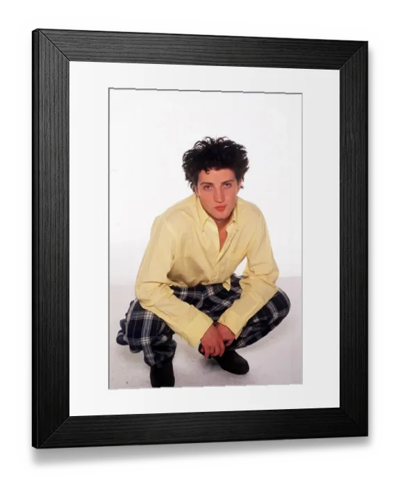 Framed Print : Fashion - Model Kate Moss brother Nick crouching wearing tartan style trousers Framed Print : Fashion - Model Kate Moss brother Nick crouching wearing tartan style trousers