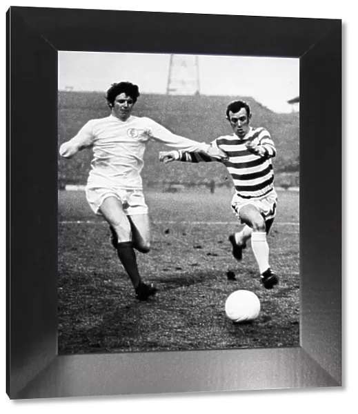 Eddie Gray of Leeds and Bobby Lennox of Celtic battle for possession
