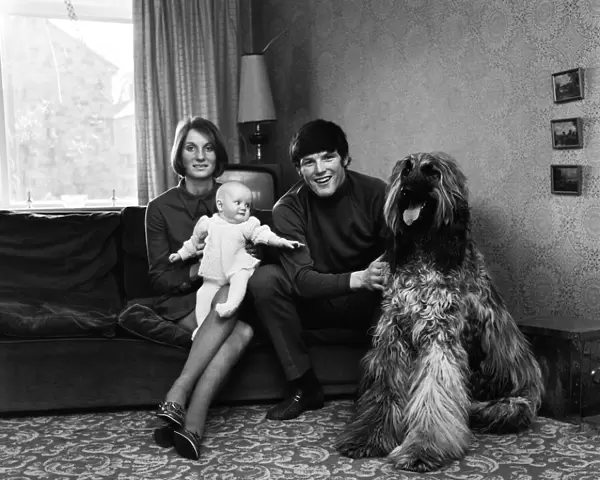 Leeds United player Eddie Gray and his wife Linda together with his 5 month old daughter