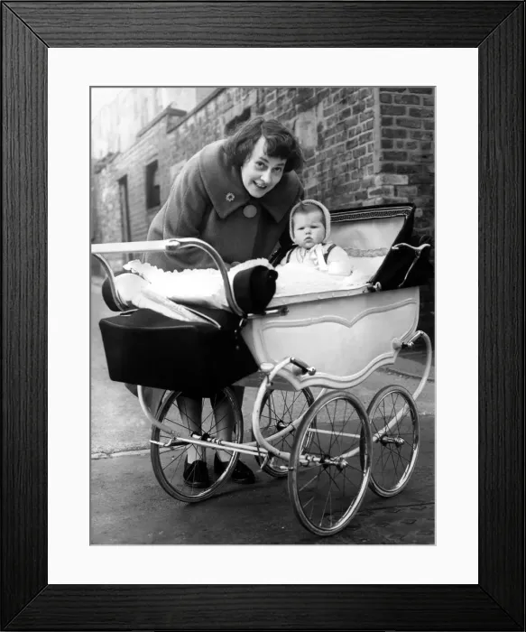 Framed Print : Mrs L jackson, of Cross Parade, with Susan in a pram which cost 5 on 23rd March 1961 Framed Print : Mrs L jackson, of Cross Parade, with Susan in a pram which cost 5 on 23rd March 1961