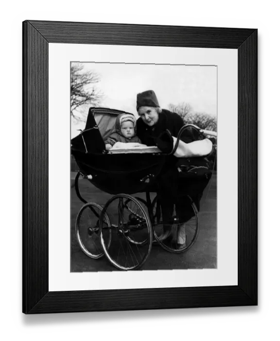 Framed Print : Mrs M Milburn with her grandson Francis John Woodley in his high pram on 23rd March 1961