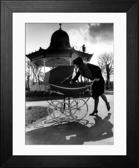 Framed Print : Model Rena, pictured in Newcastles Exhibition Park with a Silver Corss pram on 26th Framed Print : Model Rena, pictured in Newcastles Exhibition Park with a Silver Corss pram on 26th